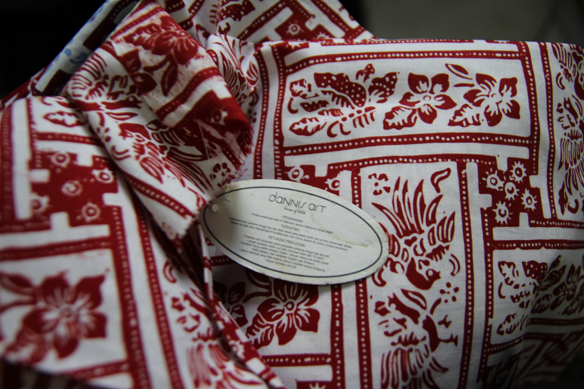 Kain cap  merah lattice